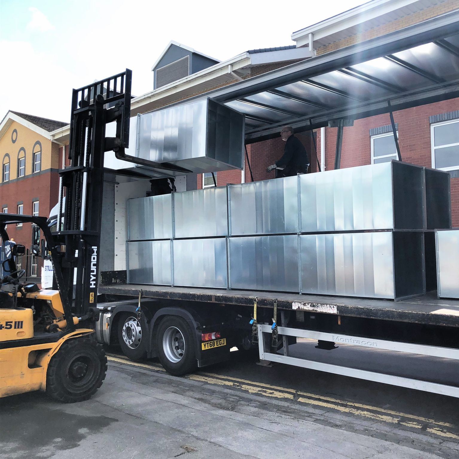 Airduct ductwork being loaded for delivery